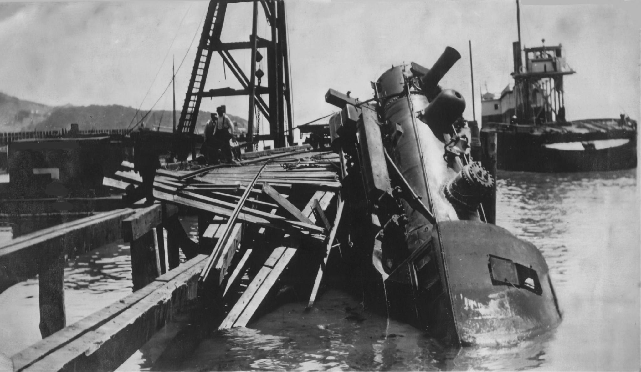 Family photograph of Northwestern Pacific Railroad locomotive No. 112 after the 1913 Tiburon pier collapse